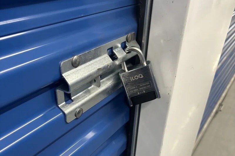 iLOQ digital padlock securing a storage unit door
